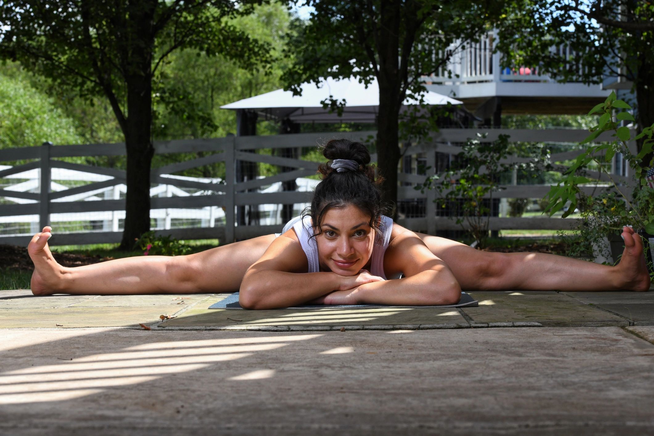 Athlete practicing yoga for recovery and flexibility
